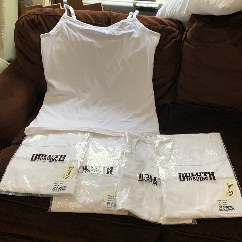 New! Five tank tops size XL. They are white.
